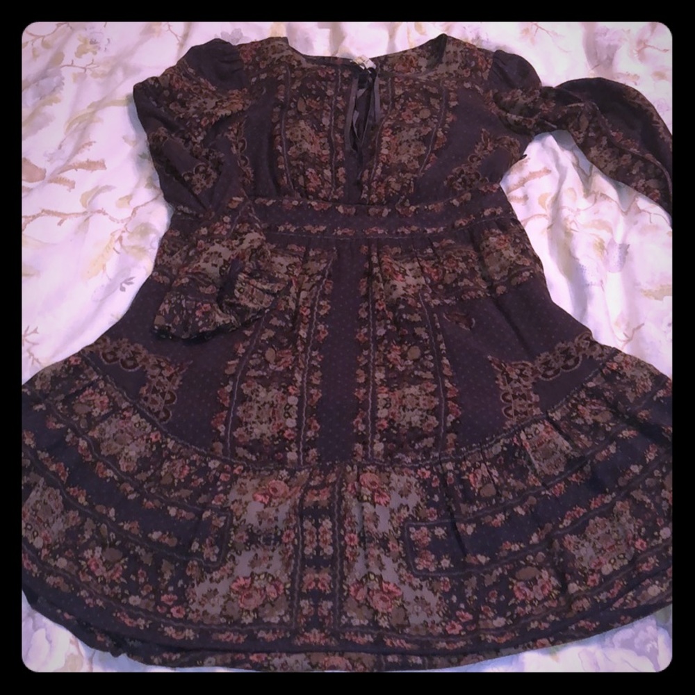 Lightly worn free people flowy floral dress.